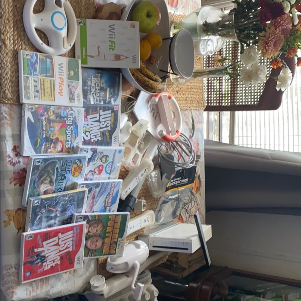 Wii with two controllers and 11 games